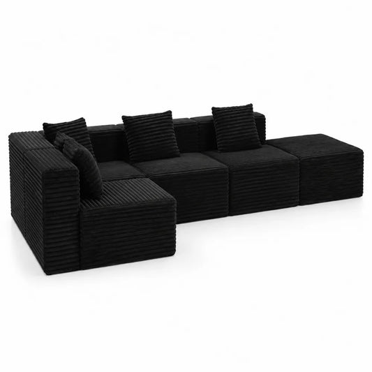 Canapé modulable en velours côtelé noir avec coussins