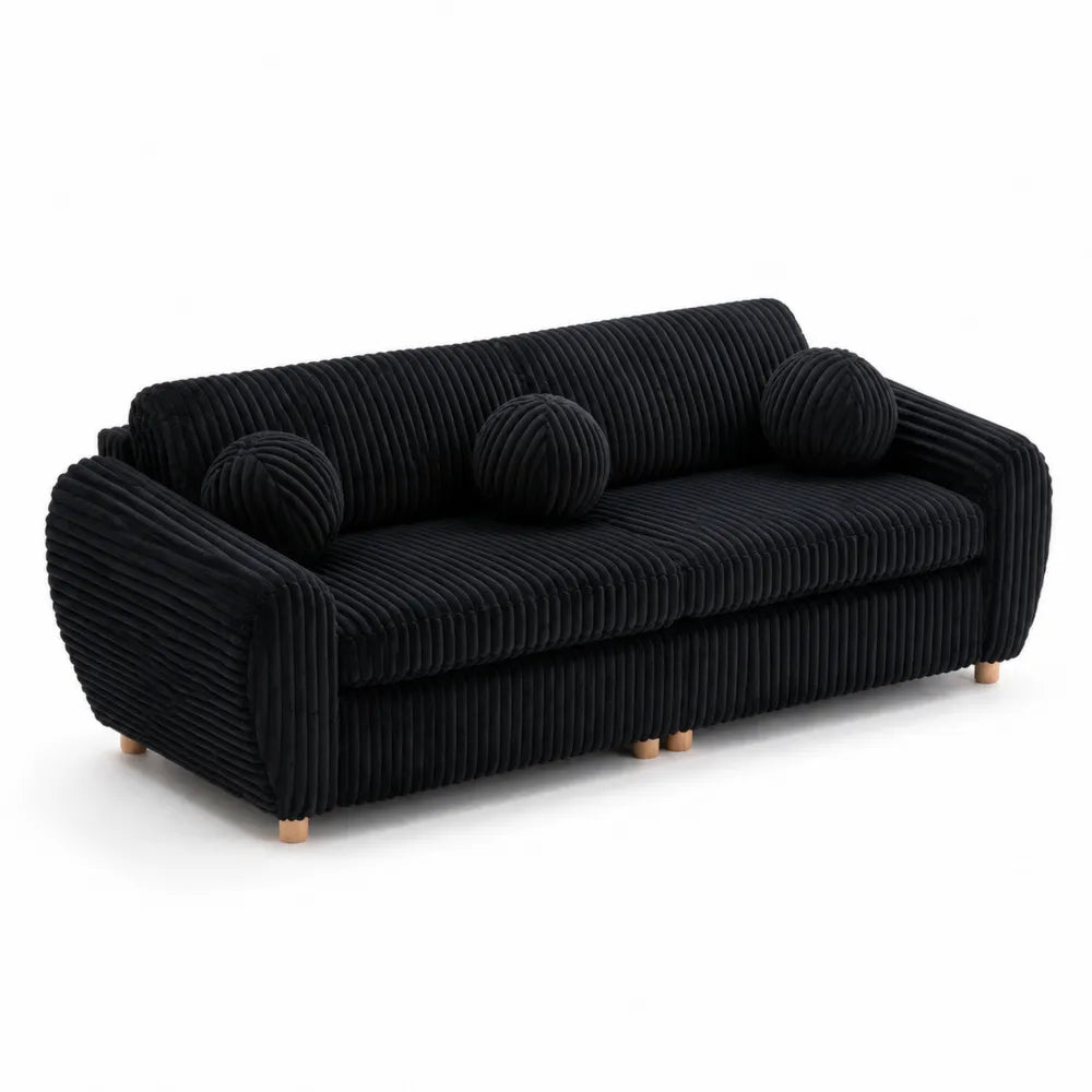 Canapé 3 places en velours noir avec coussins ronds